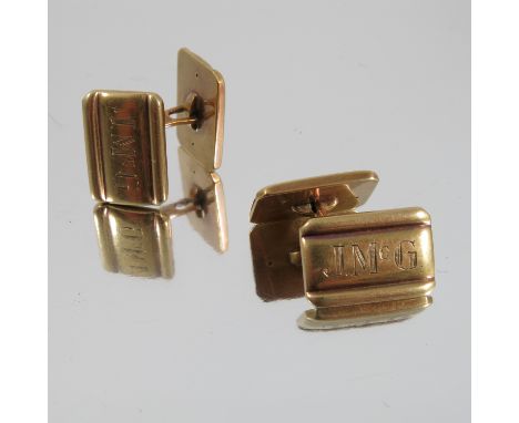 A pair of cufflinks, stamped '585', monogrammed, weight 10g gross