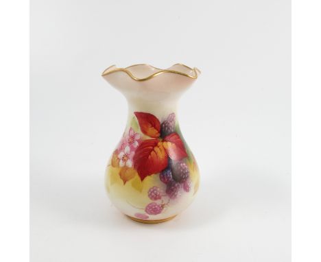 A Royal Worcester vase, with shaped rim, decorated with autumnal fruits and berries by K Blake, shape number 2492, dated 1932