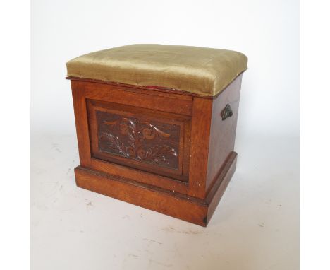 A 19th century oak and pollard oak box, with rising lid and carved front panel, width 22ins