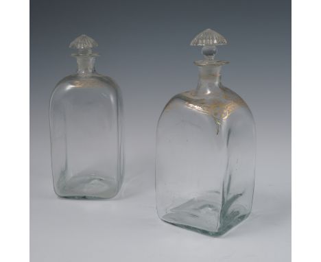 A pair of 19th century square decanters, with gilt decoration and ribbed mushroom stoppers, height 8ins, together with a ruby