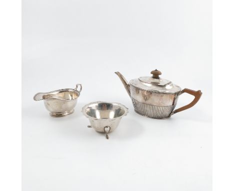 A Victorian silver teapot, with ribbed edged and gadrooned lower body, London 1883, weight 11oz all in, together with a hallm