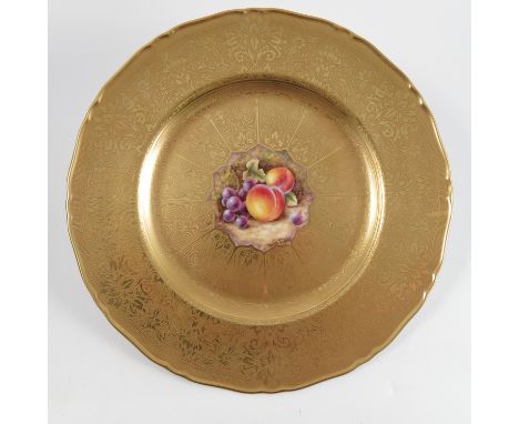 A Royal Worcester plate, acid gilt border, decorated with fruit to mossy background by S Dare, diameter 10.5ins   Condition r