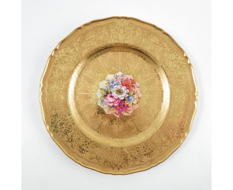 A Royal Worcester cabinet plate, with deep acid etched border, the centre decorated with flowers by Freeman, diameter 10.5ins