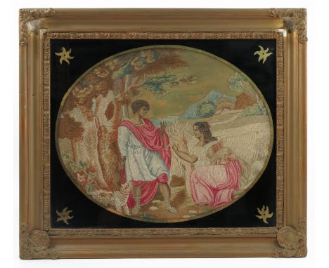 A 19th century oval tapestry picture on silk, of a woman kneeling offering corn to a man standing by a tree, in landscape, wi