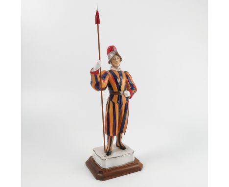 A Royal Worcester limited edition model, Trooper of the Papal Swiss Guard, modelled by Frederick Gertner, with pole, shape 35