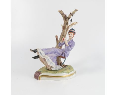 A Royal Worcester model, from the Victorian Figures series, Alice, boxed with certificate   Condition report:  Good condition