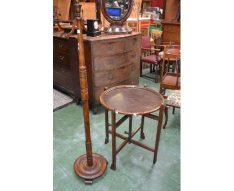 An oak standard lamp, c.1940's; an oak folding games table