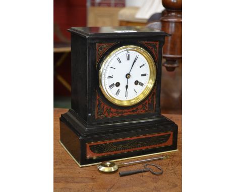 An Egyptian Revival Belgian Slate Mantel clock.