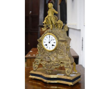 A Japy Freres cast gilt metal mantel clock, enamelled dial, Roman numerals, twin winding holes, pendulum and key.