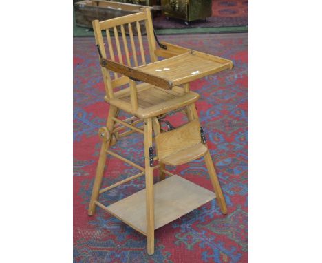 A Vintage beech metamorphic child's high chair, for display purposes only