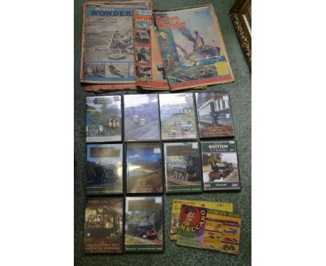 A collection of vintage Modern Wonder Pictorial Review magazines, two Meccano Toys magazines; railway DVDs.