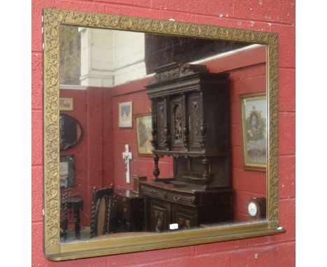 A 20th century gilt framed overmantel mirror with shelf. 89cm x 106cm (100cm x 120cm overall)