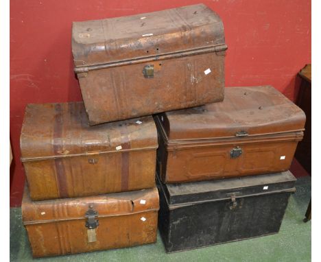 Five vintage tin trunks