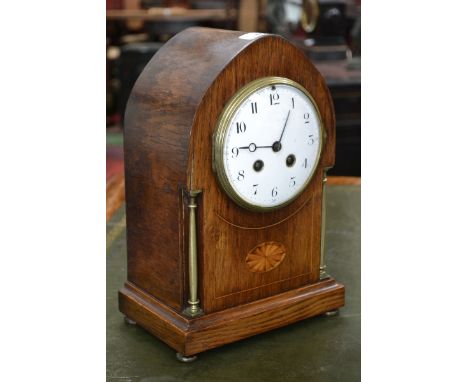 An inlaid mantel clock, the movement marked Societe Clusienne S.C.A.P.H cluses, enamelled dial, Arabic numerals, twin winding