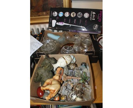 A TRAY OF GLASSWARE TOGETHER WITH A TRAY OF CERAMIC ELEPHANTS, ORNAMENTAL EGGS ETC.