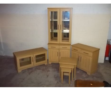 A MODERN LIGHT OAK CABINET, TV UNIT, NEST OF TABLES AND A TALL DISPLAY CABINET