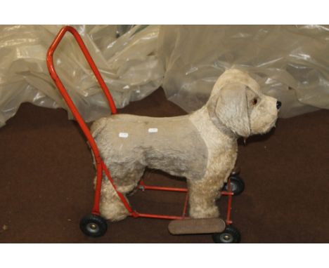 A VINTAGE PUSH A LONG DOG