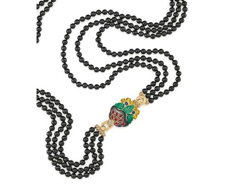 CARTIERFarbstein-Collier. Herkunft: Frankreich. Datierung: 1990. Material: 750/- Gelbgold, Punze. Gesamtgewicht: ca. 174,0 g.