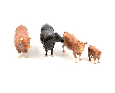 Four Beswick pottery cattle models, including Galloway Cow, 22cm, boxed, another bull, cow and calf.Condition report:There ar