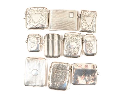 Victorian silver vesta case, Sampson Mordan &amp; Co, London 1886, ribbed form, 5cm; eight other vesta cases and a match book