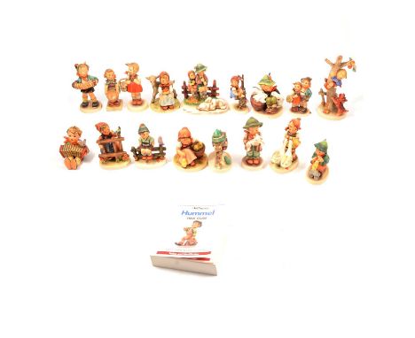 Seventeen Hummel figurines and a Warman's Hummel Field Guide, to include Playmates 58/0, Good Friends 182, Retreat to Safety 