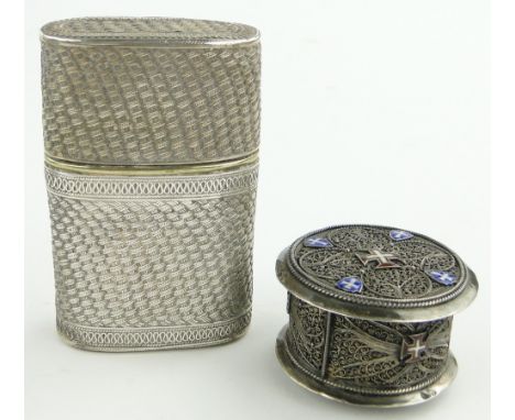 An ornate Continental silver filigree and enamel box,
possibly Maltese, indistinct Continental hallmarks, 50mm across togethe