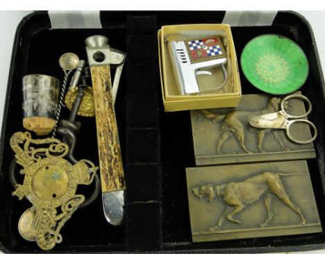 Box containing bronze dog plaques,
novelty lighter, etc.