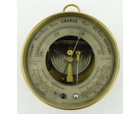 A French circular brass cased barometer, 6.5".