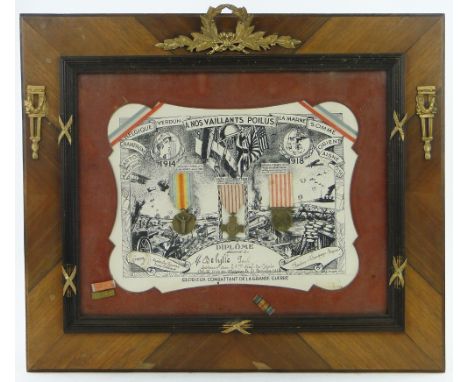 A framed group of Belgian First World War medals.