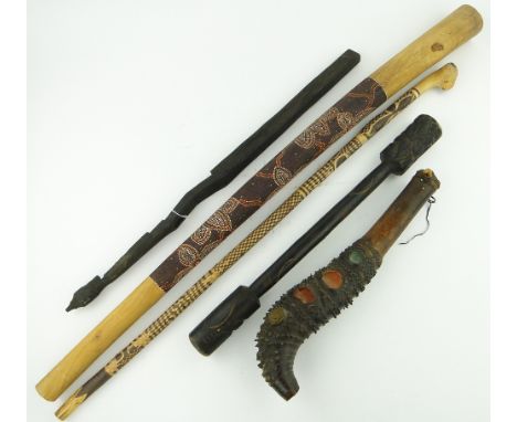 A chequered pattern tribal stick, 47"
and 4 other tribal pieces.