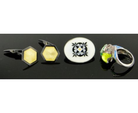 Pair of silver enamel cufflinks,
an enamel brooch and a silver and enamel ring.