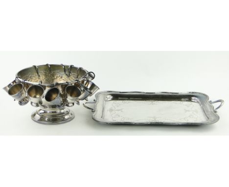 A heavy gauge Victorian electroplate 2-handled tea tray,
together with a large modern plated punch bowl, cups and ladle.