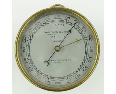 A Reynolds aneroid barometer,
brass cased, diameter 5".