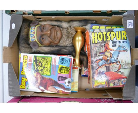 A mixed collection of items to include: Vintage Hotspur &amp; Roy of the Rovers Annuals, North American Indian Wall Plaque et