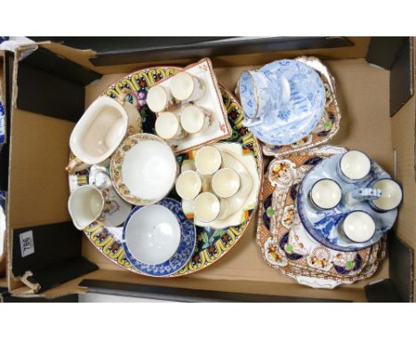 A mixed collection of items to include: Hand decorated egg cup sets, large floral decorated charger, Burgess Bros teaware , b
