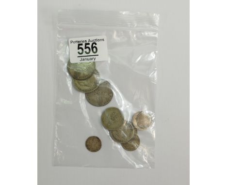 A collection of pre-1947 silver coins, 57g: 