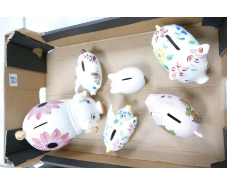 A collection of Ceramic Novelty Pig Money Boxes with Floral decoration: 