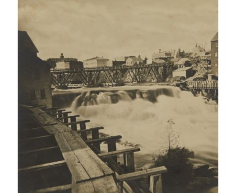 Albumen print photograph depicting a view of St. Anthony Falls in Minneapolis, Minnesota, ca. 1867. Depicting from left to ri