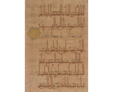 Leaf from an impressive Ilkhanid Qur'an, in Arabic, decorated manuscript on buff paper [Eastern Ilkhanate territories, second