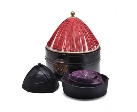 A group of Chinese mandarin's hats, Qing Dynasty, 19th century, incorporating a summer hat made of silk gauze on a bamboo fra