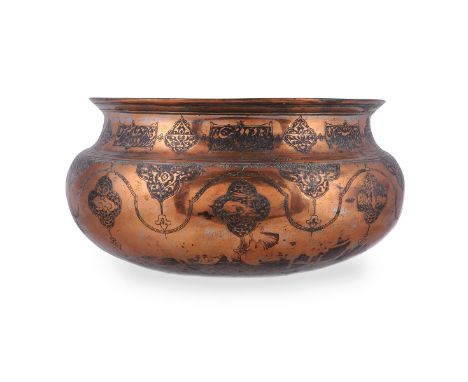 A Safavid large tinned copper bowl, Iran, late 16th or 17th century, with various calligraphic cartouches, 36cm wide x 18cm h