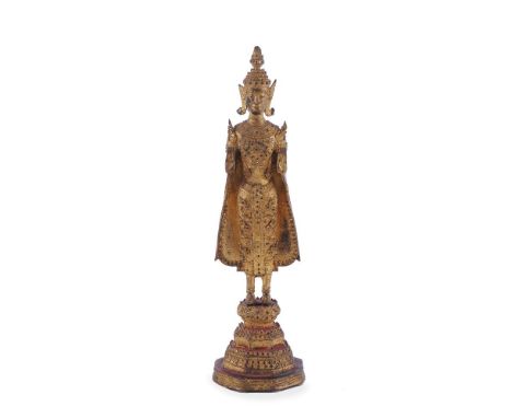 A Thai gilt-bronze standing Buddha, Rattanakosin, first half of 20th century, both hands raised and facing forward, 37cm high