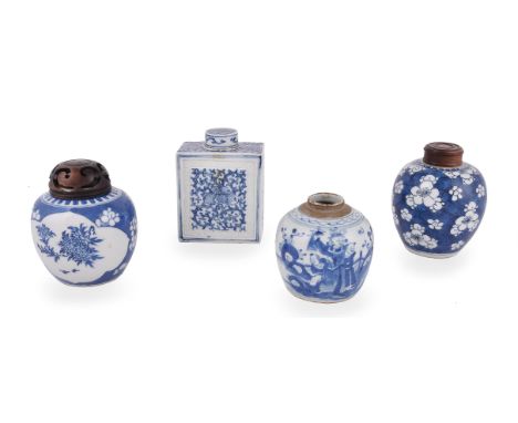 A Chinese large blue and white tea caddy, Qing Dynasty, 18th century, with moulded key-fret bands and painted with flowers an