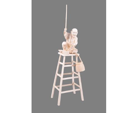 Y A Japanese Ivory Figure of a Fisherman, he kneels on a platform at the top of a ladder from which his creel hangs, one arm 