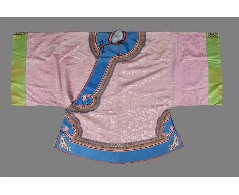 A Chinese pink lady's robe, Qing Dynasty, circa 1880, with green embroidered sleeve bands and blue borders decorated with lar