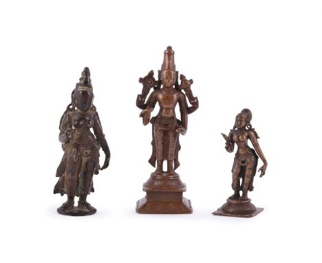 Three Indian bronze deities, Southern India, 18th-19th centuries, comprising: a figure of Vishnu, the four-armed Hindu deity 
