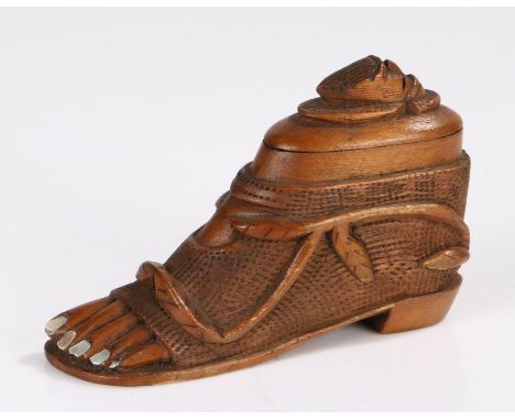 19th Century novelty snuff box, the carved wooden body modelled as a sandal clad foot with mother of pearl toenails and mask 