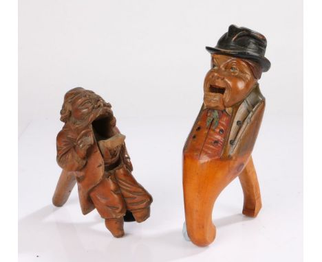 19th Century nut cracker, the nut cracker carved as a moustached gentleman with a long coat, AF, 18cm high, together with a p