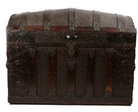 Victorian embossed leather mounted trunk, the banded domed lid and body with anchor cast mounts and foliate embossed leather,