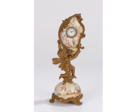 An Austrian / Vienna desk clock, the enamel dial being held by a gilt putto in a pictorial panel depicting figures in a garde